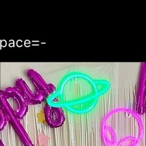 Green neon planet sign